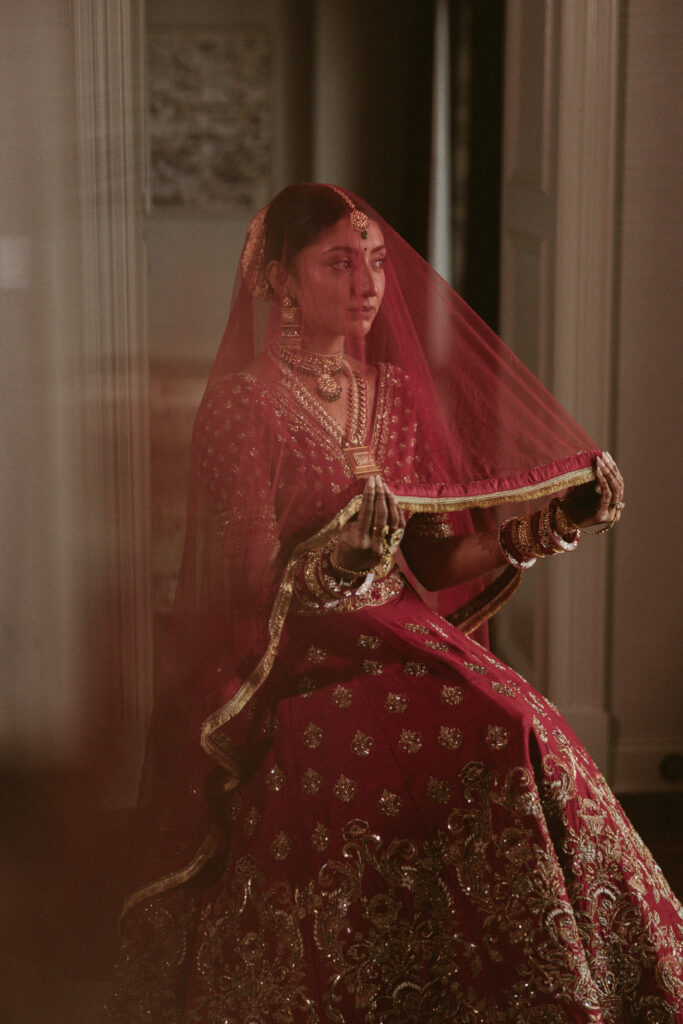 Moody bridal portrait of an Indian bride